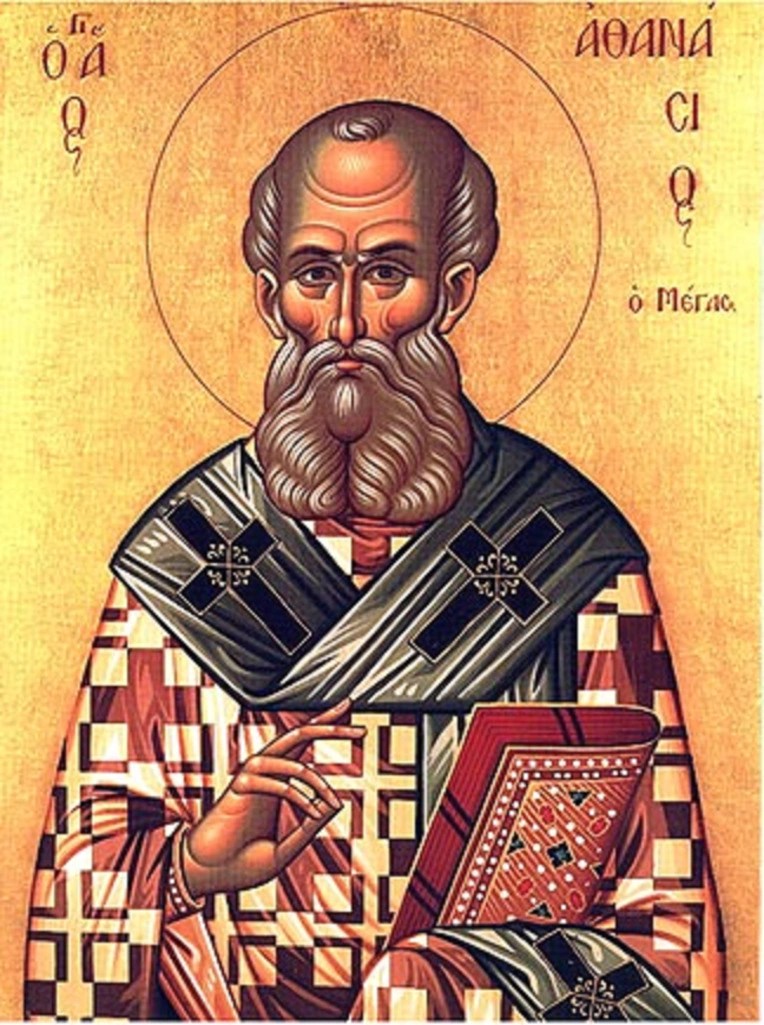 An icon of St. Athanasius holding a Gospel book and making the sign of the Cross his hand.