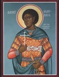 An icon of St. Maurice holding a budding cross and a sword.