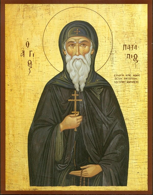 An icon of St. Patapius holding a 3 bar cross.