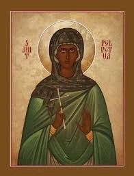 An icon of St. Perpetua holding a cross.